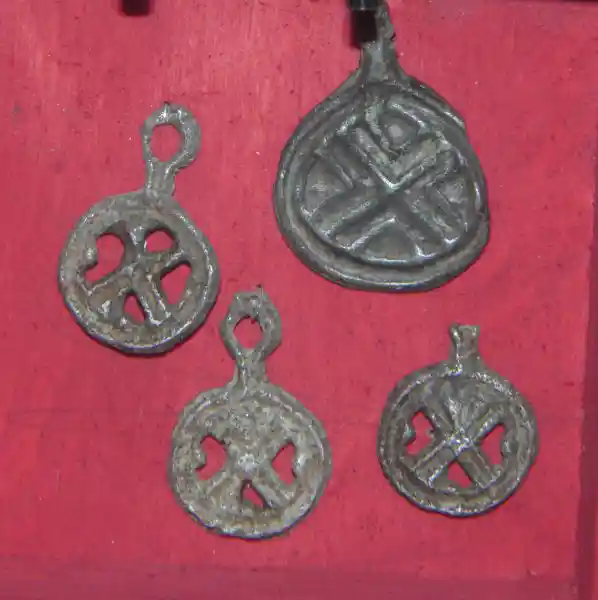 Old pendants, solar crosses